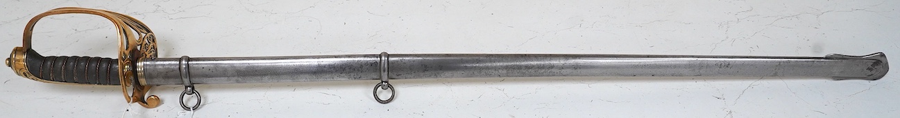 A Victorian 1845 pattern British Infantry Officer’s sword, by Hills Brothers of Old Bond Street, London, solid brass hilt in its steel dress scabbard, blade 81cm. Condition - fair, generally worn.